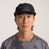 Mathis 5 Panel Strapback Hat in Chaos Black