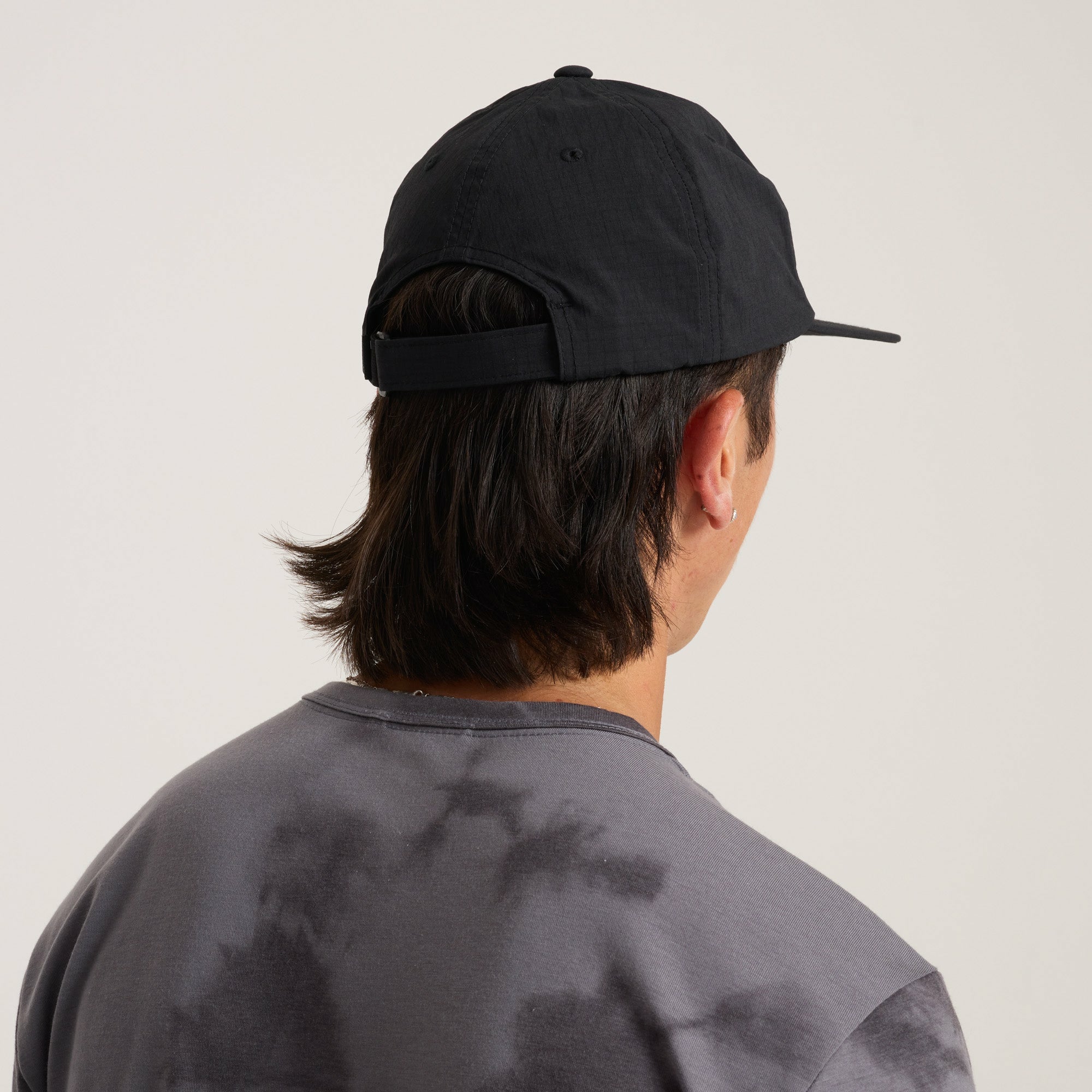 Mathis 5 Panel Strapback Hat in Chaos Black